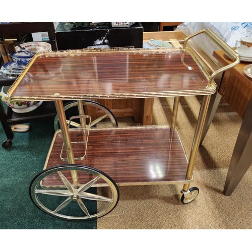 196 - TWO TIER COCKTAIL/DRINKS TROLLEY - WITH GILT DECORATION/WHEELS, BOTTLE HOLDER