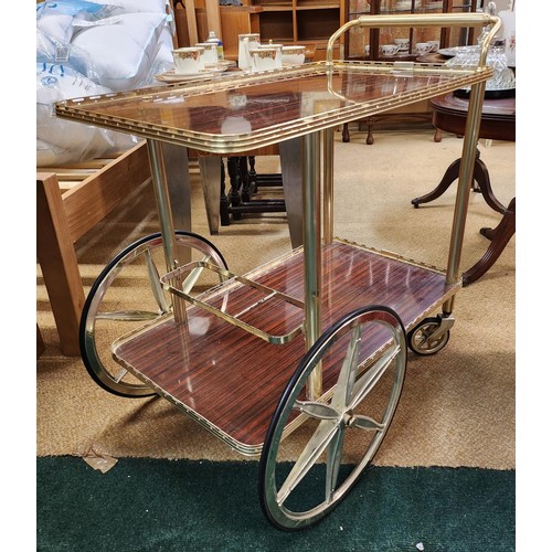 196 - TWO TIER COCKTAIL/DRINKS TROLLEY - WITH GILT DECORATION/WHEELS, BOTTLE HOLDER