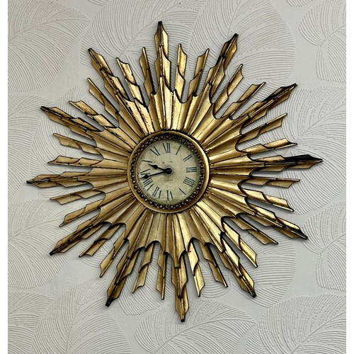 205 - A QUARTZ REPRODUCTION GILT SUNBURST CLOCK