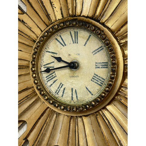 205 - A QUARTZ REPRODUCTION GILT SUNBURST CLOCK