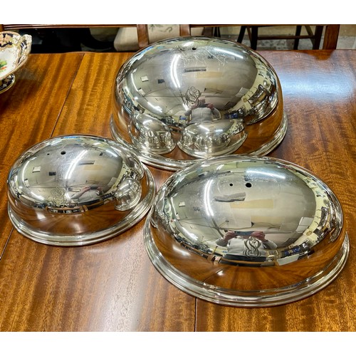 288 - Mappin & Webb plated dome covers or cloches -three (3)