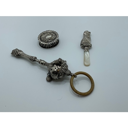 290 - TWO (2) EDWARDIAN SILVER RATTLES AND AN OVLA SILVER ROCOCO PILL BOX WITH LID