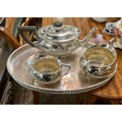 302 - A SILVER PLATED TEA SET BY MAPPIN & WEBB - TEAPOT, MILK & SUGAR ON A VINERS CHASED DESIGN TRAY