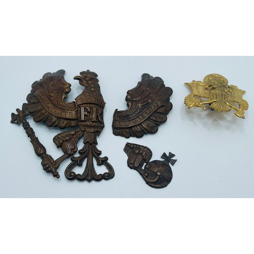 324 - GERMAN PICKELHAUBE HELMET BADGE BROKEN IN THREE PIECES C.1914-18, TOGETHER WITH AN AMERICAN WWII OFF... 