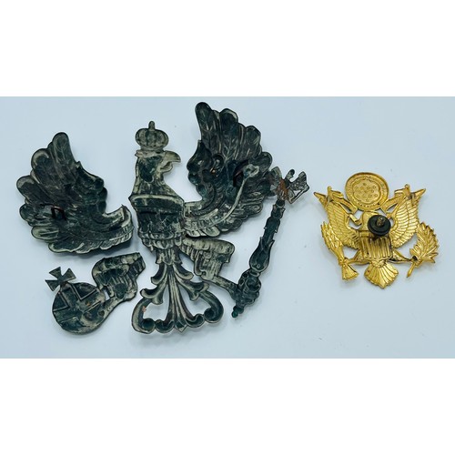 324 - GERMAN PICKELHAUBE HELMET BADGE BROKEN IN THREE PIECES C.1914-18, TOGETHER WITH AN AMERICAN WWII OFF... 