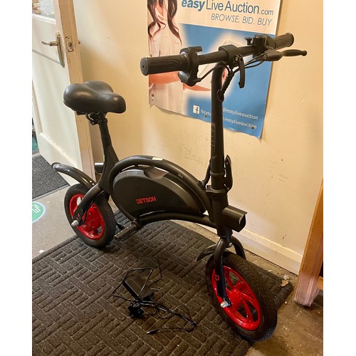 145 - JETSON ELECTRIC RIDEON CYCLE WITH CHARGER - NOTE BATTERY FAULT OVER HEATS ADVISE NEW BATTERY