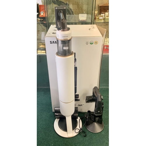 100 - BOXED SAMSUNG BESPOKE JET WITH ALL IN ONE CLEAN STATION, CHARGER AND SELF EMPTYING BAG - WHITE