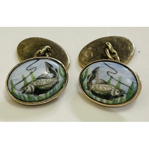 366 - A PAIR OF MATCHED YELLOW METAL AND ENAMEL CUFFLINKS DEPICTING A TROUT ON A FISHING LINE BOTH STAMPED... 