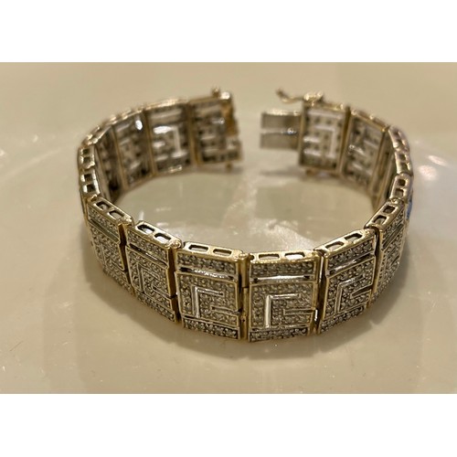 369 - A 9CT GOLD & DIAMOND ART DECO GREEK KEY PATTERN BRACELET