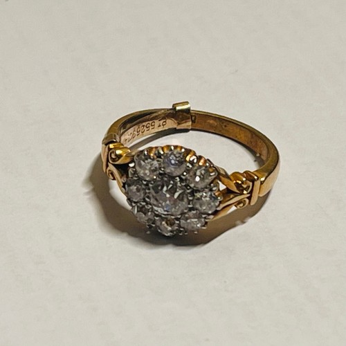 377 - 18 ct Yellow Gold & Diamond Cluster Ring - a large old cut central solitaire diamond surrounded by e... 