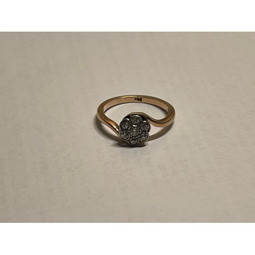 379 - 18CT YELLOW GOLD & DIAMOND FLORET CLUSTER RING - OLD CUT CENTRAL STONE SURROUNDED BY SIX (6) SMALLER... 