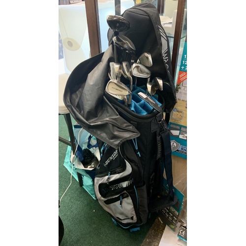 29 - DUNLOP SPOT GOLF BAG AND MIXTURE OF GOLF CLUBS INC. DRIVER AND IRONS - SOME HIPPO, TOP FLITE, TITLEI... 