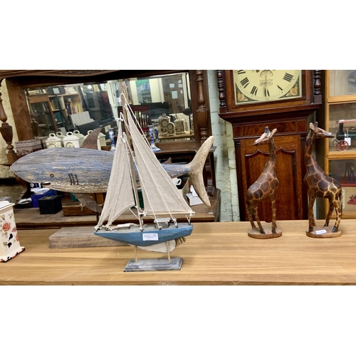 190 - 4 TREEN ITEMS INCL A LARGE SHARK ON STAND, SAILBOAT AND A PAIR OF GIRAFFES