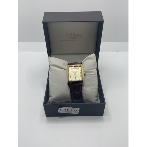 302 - BOXED ROTARY GENTS LOZENGE SHAPED FACE WATCH ON BROWN LEATHER STRAP