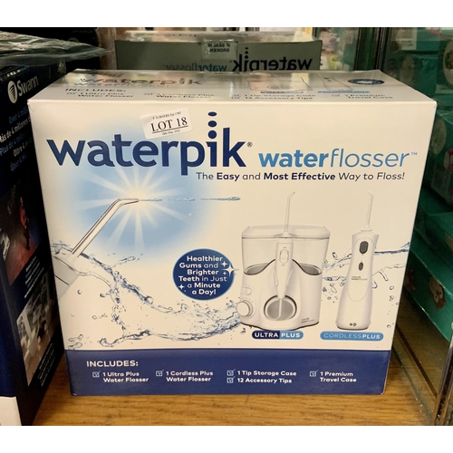 18 - BOXED WATERPIK WATER FLOSSER ULTRA PLUS AND CORDLESS