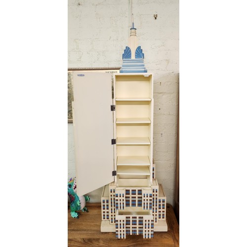 216 - UNUSUAL STORAGE CABINET WITH ADJUSTABLE SHELVES AND 2 DRAWERS - IN THE SHAPE OF THE EMPIRE STATE BUI... 