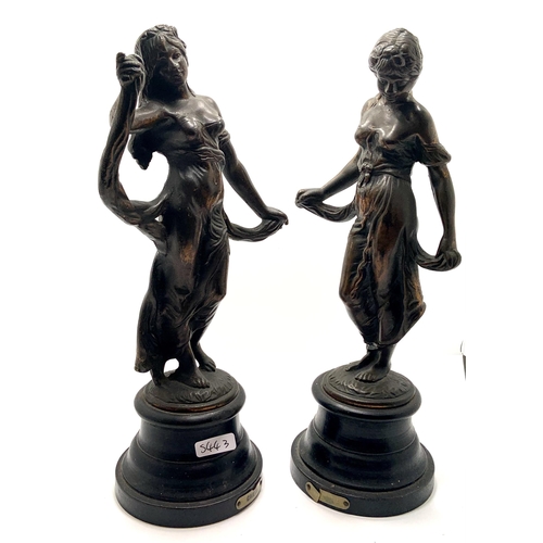 313 - A PAIR OF SPELTER FIGURINES ON WOODEN BASES WITH LABELS MARKED 'GAIETY'