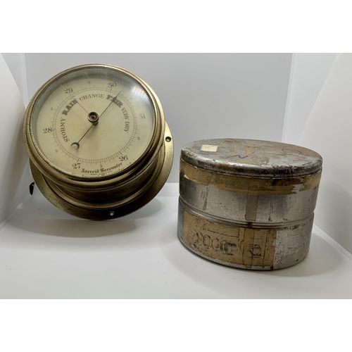 317 - BRASS ANEROID BAROMETER TOGETHER WITH AN ALUMINIUM BAROMETER TIN