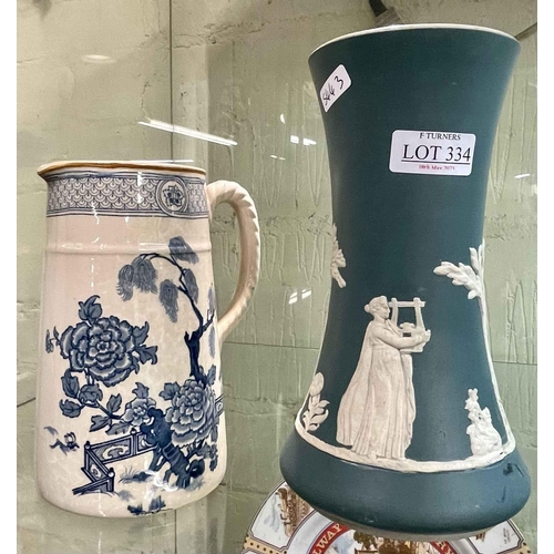 334 - RIDGWAYS HANOVER BLUE AND WHITE PATTERNED VICTORIAN JUG TOGETHER WITH A DUDSON JASPERWARE VASE