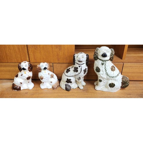 250A - COLLECTION OF 4 POT DOGS VARIOUS SIZES (NOTE 1 HAS OLD REPAIR)