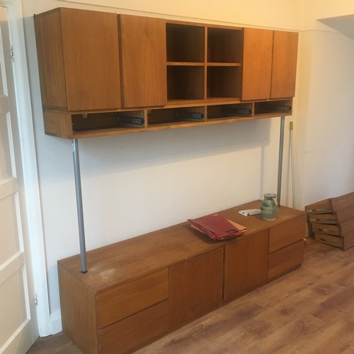 239 - A TEAK MODULAR WALL MOUNTED UNIT -IN 3 PARTS -FLOOR STANDING CUPBOARD AND DRAWER UNIT, CENTRE DRAWER... 