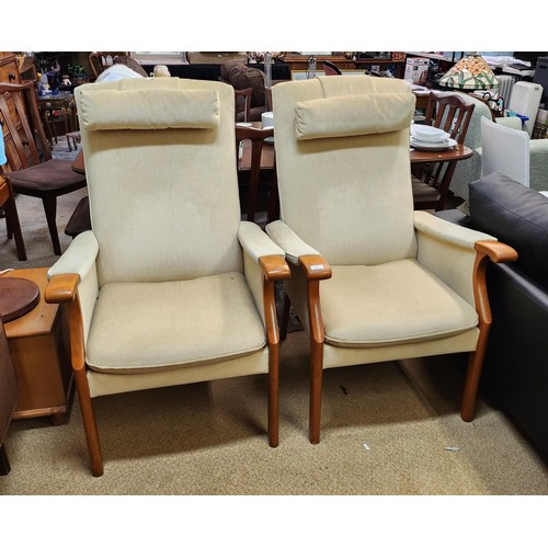 PAIR OF PARKER KNOLL WING BACK FIRESIDE CHAIRS.