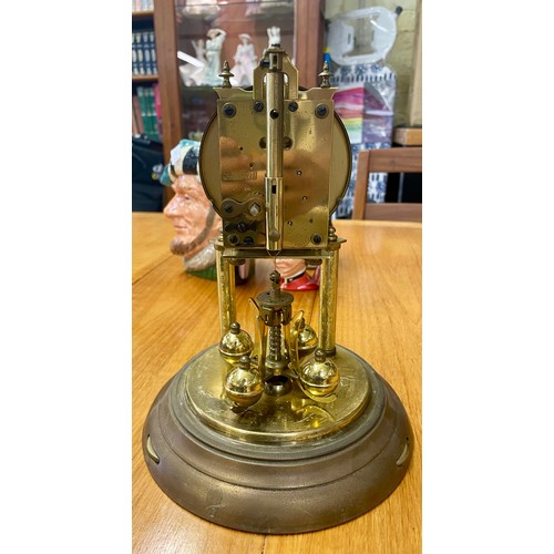 351A - LCHATZ BRASS CARRIDGE CLOCK ENCASED IN A GLASS DOME WITH KEY