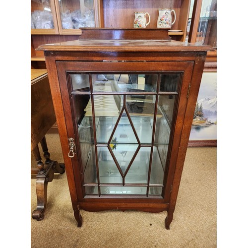 212 - MAHOGANY MUSIC CABINET ON RAISED LEGS WITH LATER GLASS SHELVES - KEY