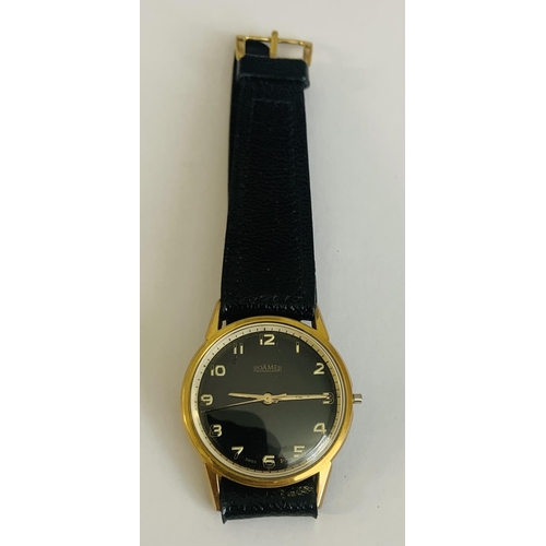 314 - ROAMER BREVETE 305/7/8 AUTOMATIC WATCH BLACK DIAL WITH ARABIC LUMINESCENT NUMERALS -YELLOW METAL CAS... 