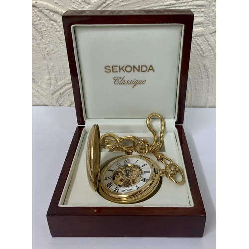 336 - SEKONDA CLASSIQUE KEYLESS SKELETON FOB WATCH IN YELLOW METAL WITH BOX AND CHAIN, WHITE OUTER DIAL WI... 