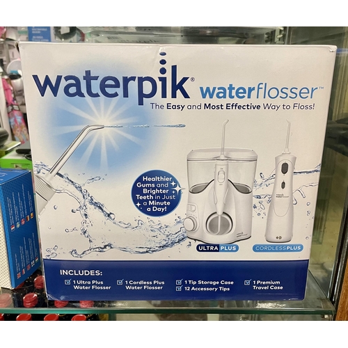 39 - BOXED WATERPIK WATER FLOSSER WITH ULTRA PLUS AND CORDLESS PLUS