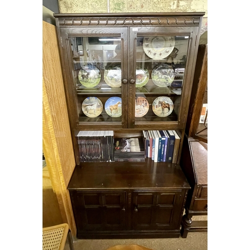 260 - AN ELM ERCOL DISPLAY CABINET, TWO DRAWER BASE, OPEN SHELF DOUBLE GLAZED DOORS WITH ADJUSTABLE SHELVE... 