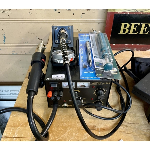 344 - AN AOYUE INT 909 REPAIRING SYSTEM WITH A VACUUM SUCTION PEN, SOLDERING TOOL ETC.