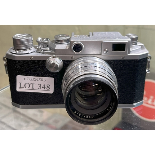 348 - A VINTAGE CANON SLR CAMERA WITH A JUPITER 8 LENS - 210097