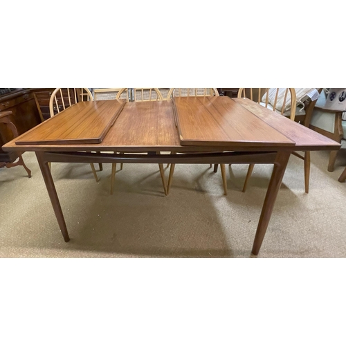 270 - AN EXTENDING DRAW LEAF MID-CENTURY G-PLAN DINING TABLE MARKED E. GOMME DANISH DESIGN WITH 2 EXTRA LE... 