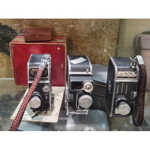 385 - A BOLEX PAILLARD 8SL CINECAMERA TOGETHER WITH A BOLLEX PAILLARD C8 AND A SPARE LENS AND CASE TOGETHE... 