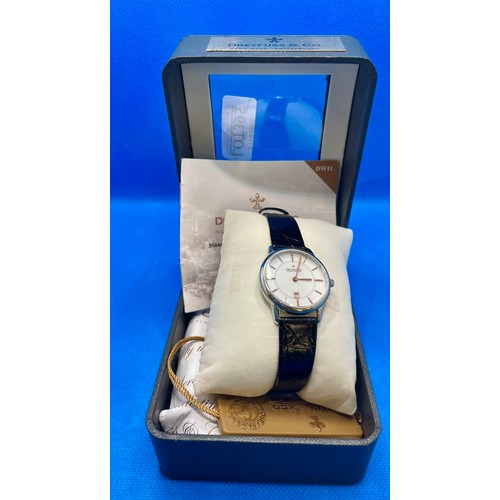 A DREYFUSS AND CO LADIES SILVER COLOURED QUARTZ WATCH ON BLACK STRAP