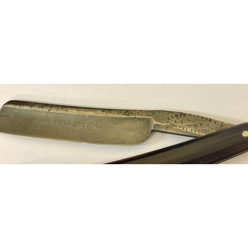 212 - AN EBONISED HANDLED CUTTHROAT RAZOR BY EDWIN BLYDE & CO -MARKED GROUND ON A 3 INCH STONE IN A VICTOR... 