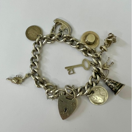 UNUSUAL SILVER CHARM BRACELET -SILVER PADLOCK MARKED 'GJ Ltd' -GEORG ...