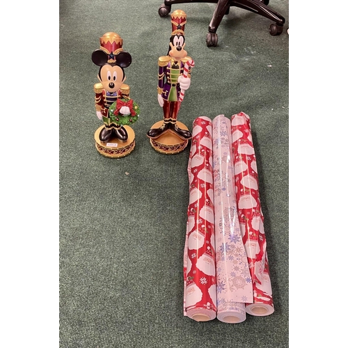 4 - SET OF 2 DISNEY NUTCRACKERS WITH LIGHTS AND MUSIC TOGETHER WITH 3 LARGE ROLLS OF WRAPPING PAPER