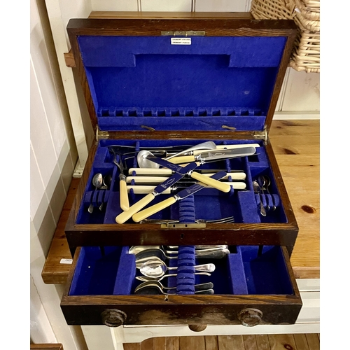 228 - AN OAK CANTEEN WITH VARIOUS CUTLERY AND A SET OF MODERN CUTLERY