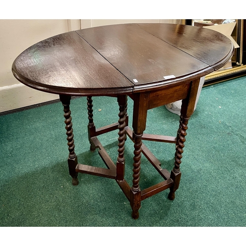 253 - A JACOBEAN OAK STYLE TWIST LEG DROP LEAF SIDE TEA TABLE