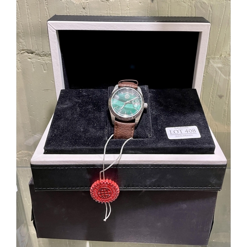 408 - CONSTANTIN WEISZ LTD EDITION GENTS WATCH - SERIAL 941806, GREEN FACE BROWN STRAP, WITH BOX AND PAPER... 