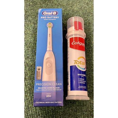 34 - 1 X ORAL B PRO BATTERY ELECTRIC TOOTHBRUSH - DGD PACKAGING TOGETHER WITH A TUBE OF COLGATE TOOTHPAST... 