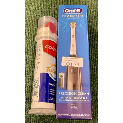 35 - 1 X ORAL B PRO BATTERY ELECTRIC TOOTHBRUSH (BLACK) - DGD PACKAGING TOGETHER WITH A TUBE OF COLGATE T... 