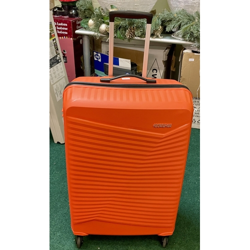 266 - LARGE AMRICN TOURISTER HARDSIDE SPINNER SUITCASE - IN ORANGE