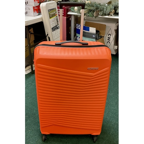 267 - LARGE AMERICAN TOURISTER HARDSIDE SPINNER SUITCASE - IN ORANGE