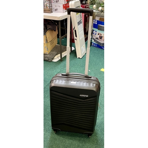 269 - AMERICAN TOURISTER CABIN SIZE HARDSIDE SPINNER SUITCASE - IN BLACK