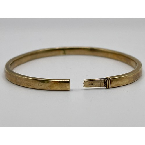 340 - 9ct. YELLOW HOLLOW GOLD HINGED BRACELET H/M LONDON IMPORT 1991