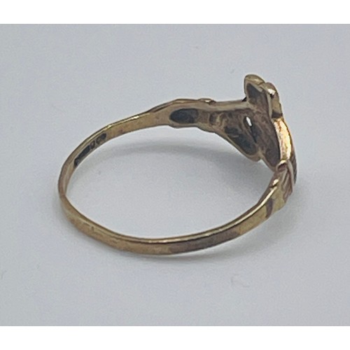 353 - A 9CT YELLOW GOLD 'CLADDAGH' RING ALL MARKS RUBBED 1G